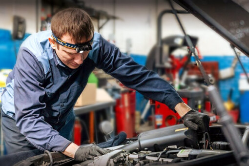 Mechanics performing repair and maintenance work on Porsche at Bay Diagnostic in Brooklyn, NY