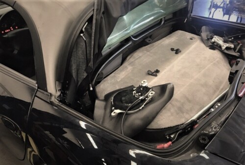 repairing the top on a porsche boxster