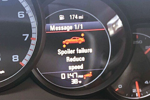 Porsche spoiler failure reduce speed message