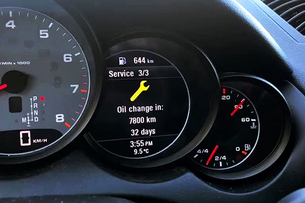 Porsche Macan dashboard or driver information display for maintenance service