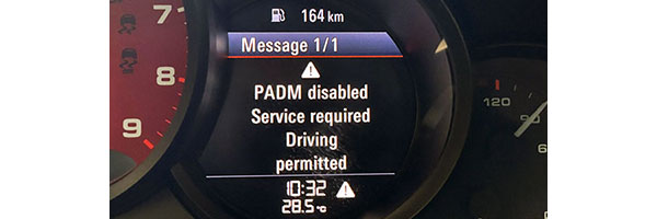 Porsche dashboard warning lights and messages.