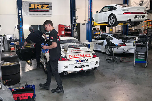Porsche mechanics at Premier Racing, a recommended Porsche specialist shop in Las Vegas, NV, specializing in Porsche repair and maintenance.